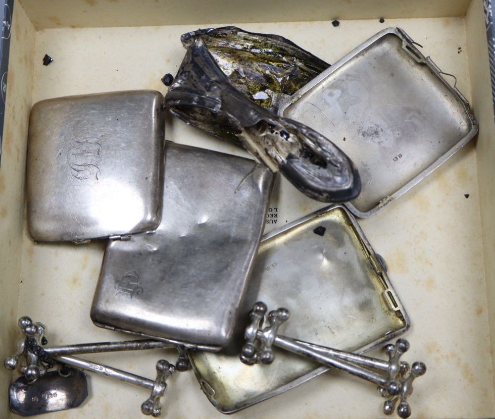Small silver and other items including a pair of toast racks, four knife rests, ashtrays, 19th century wine label etc.